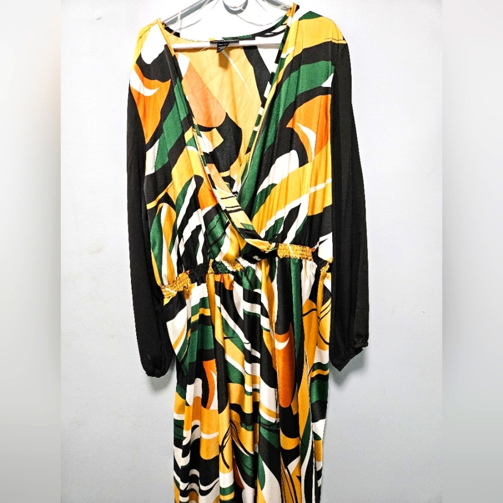 Plus size muti color maxi dress with mesh black sleeves.